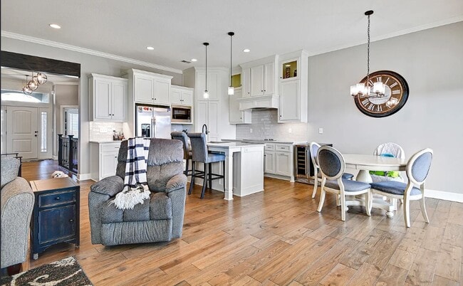 Photo - 4 BR/3BA | Newly Renovated Single Family Home | 3-Car Covered Parking | Back Deck