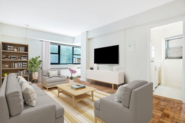 One-bedroom apartment living area (virtually staged) - The Diplomat Apartments