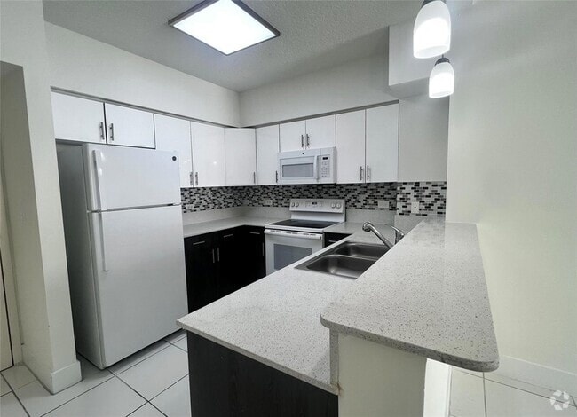 Building Photo - 2601 NW 16th St Rd Unit 309 Rental