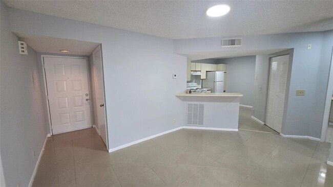 Photo - 9055 Wiles Rd Unit 5-106
