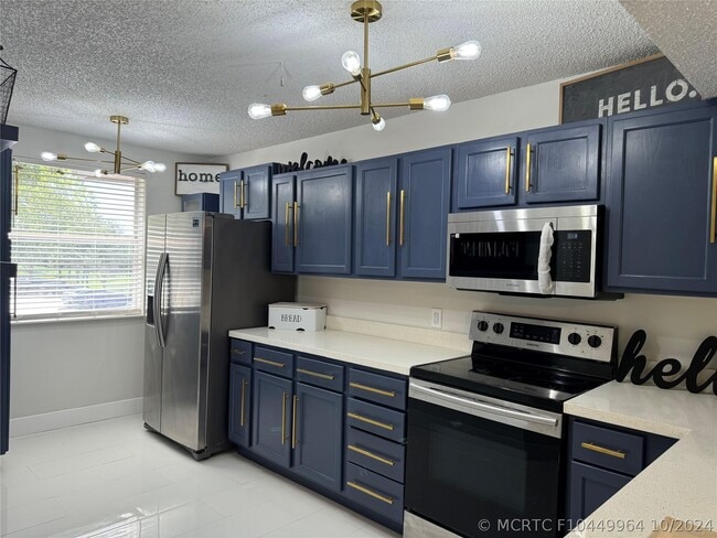 Photo - 8891 Wiles Rd Unit 208