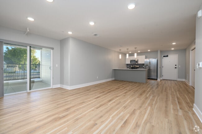 2BR, 1BA - 992SF - Living Room and Kitchen - The Watershed