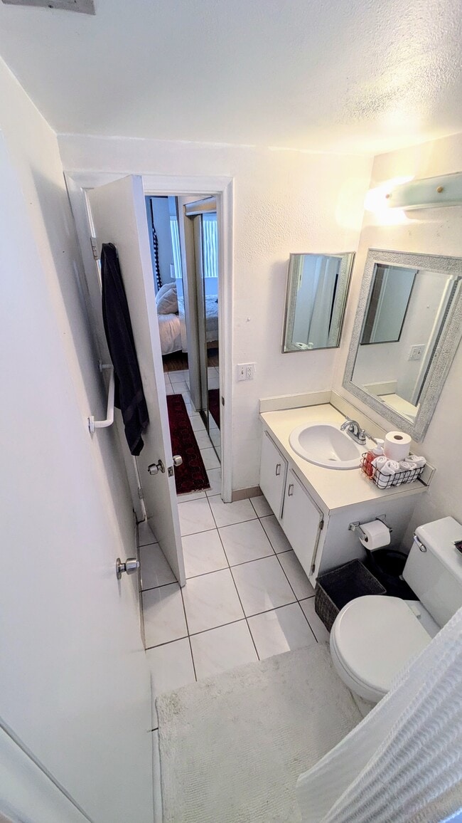 Building Photo - 7701 Camino Real Unit A304