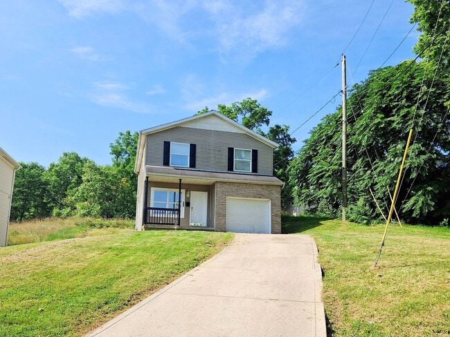 Building Photo - 4 Bed / 2 Full Bath House with Brand-New Kitchen, Attached Garage, and Full Basement - Built 2001