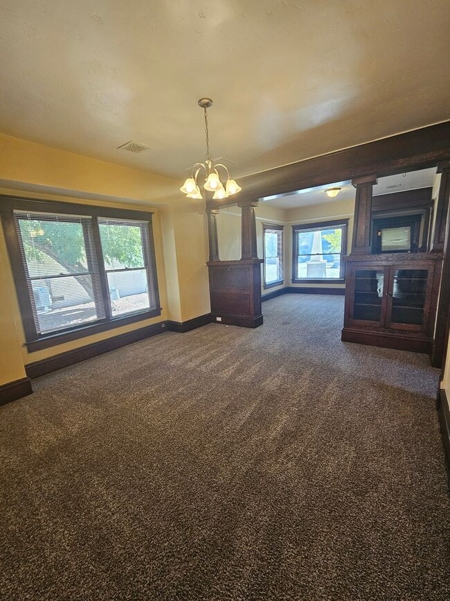 Photo - 1/2 OFF FIRST MONTH'S RENT IF RENTED IN DEC! Charming 2 Bedroom with Bonus/Laundry Room