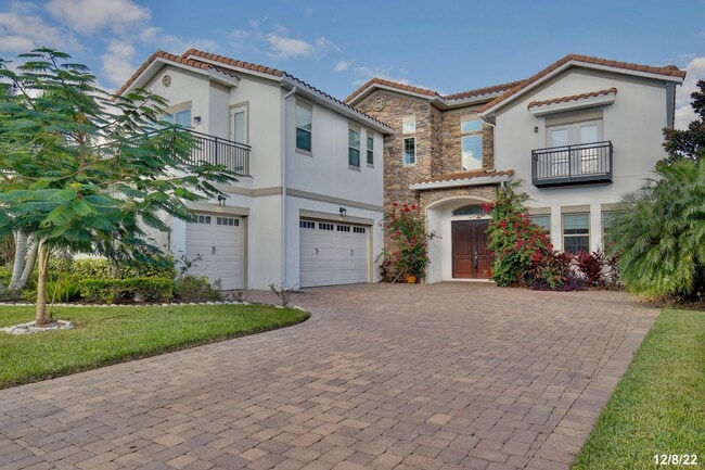 Building Photo - Stunning 4/5 Executive Pool Home in the Guard-Gated Golf Course Community of Eagle Creek - Orlando!