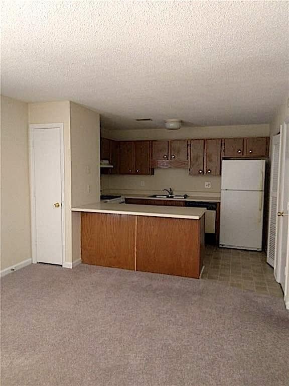 Building Photo - 1600 Oakpoint Dr SW Unit G