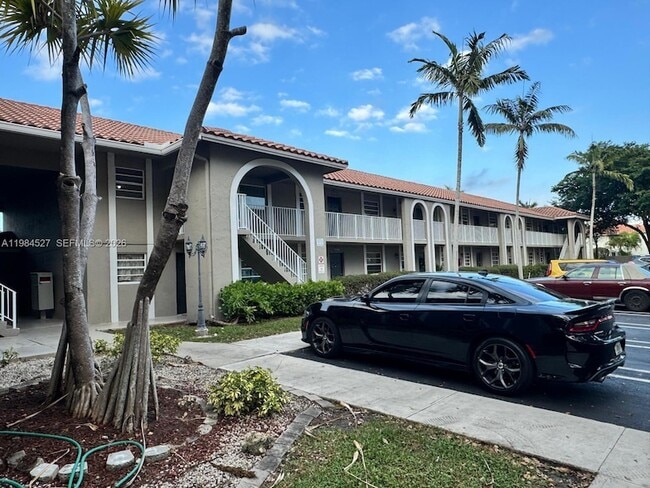 Building Photo - 11207 Royal Palm Blvd Unit 11207