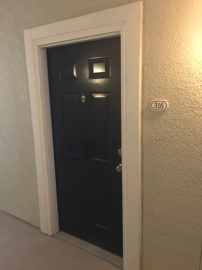 Front Door- Door has been updated to electronic lock system - 8290 Gate Pkwy W Unit 316