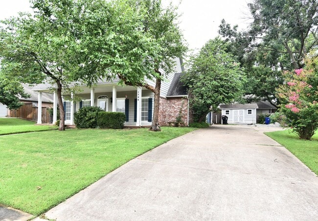 Photo - Look at that amazing Front Porch!! Room to gather inside and out.
