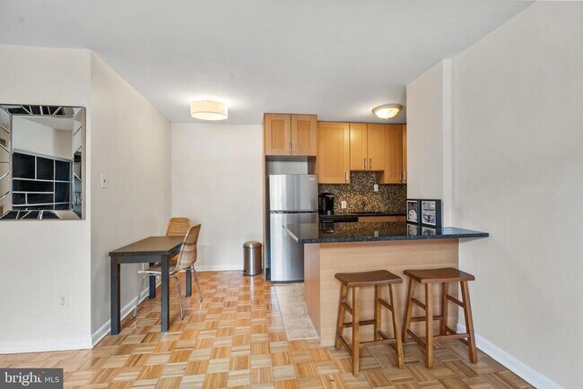 Building Photo - 950 25th St NW Unit 717