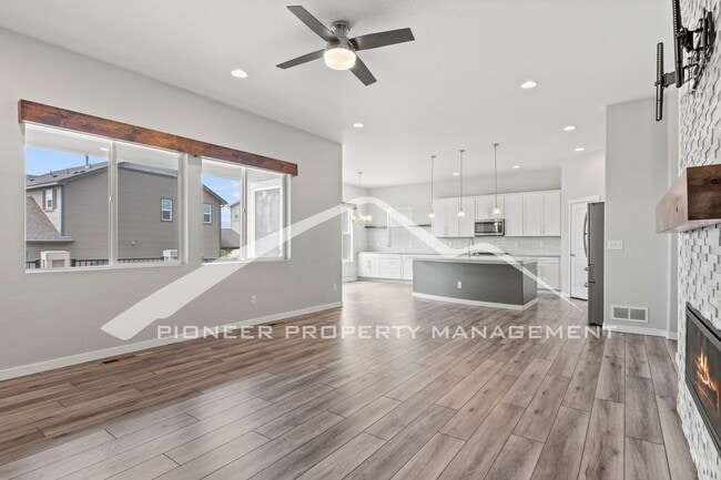 Photo - Elegant Ranch-Style Home with Main Floor Primary Bedroom with 3-Car Garage and Finished Basement ...