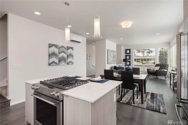 Photo - Spacious 4-Bed, 2.5-Bath Townhome with Mod...