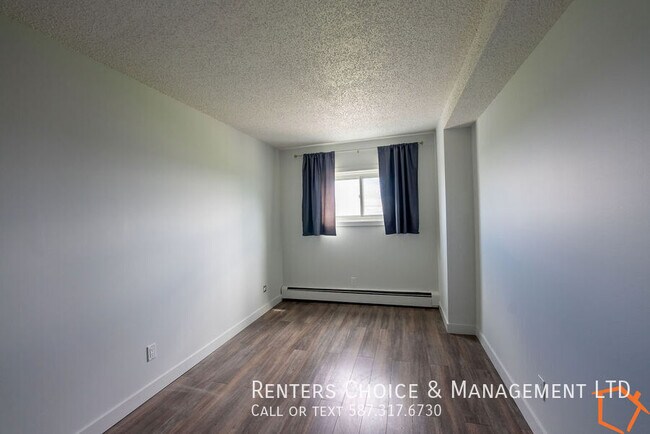 Photo - Top Floor Condo, Assigned Parking, Utilities Included