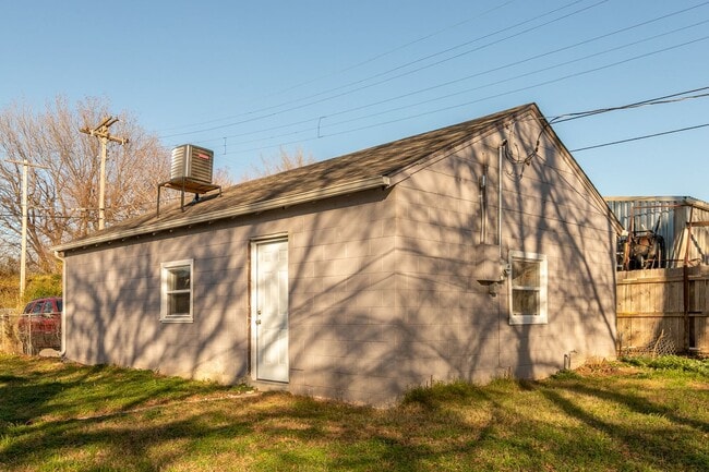 Building Photo - N Lewis Pl Triplex Unit 2410 E Oklahoma St - 1345 Back
