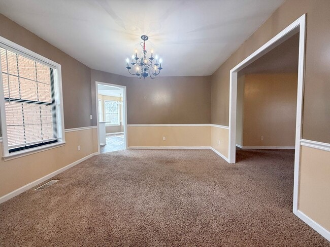 Photo - Charming Single-Level 3 Bedroom Home with Large Back Porch and 2-Car Garage