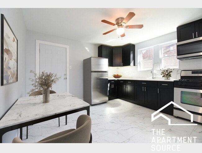 Building Photo - 5128 W Henderson St Unit 3