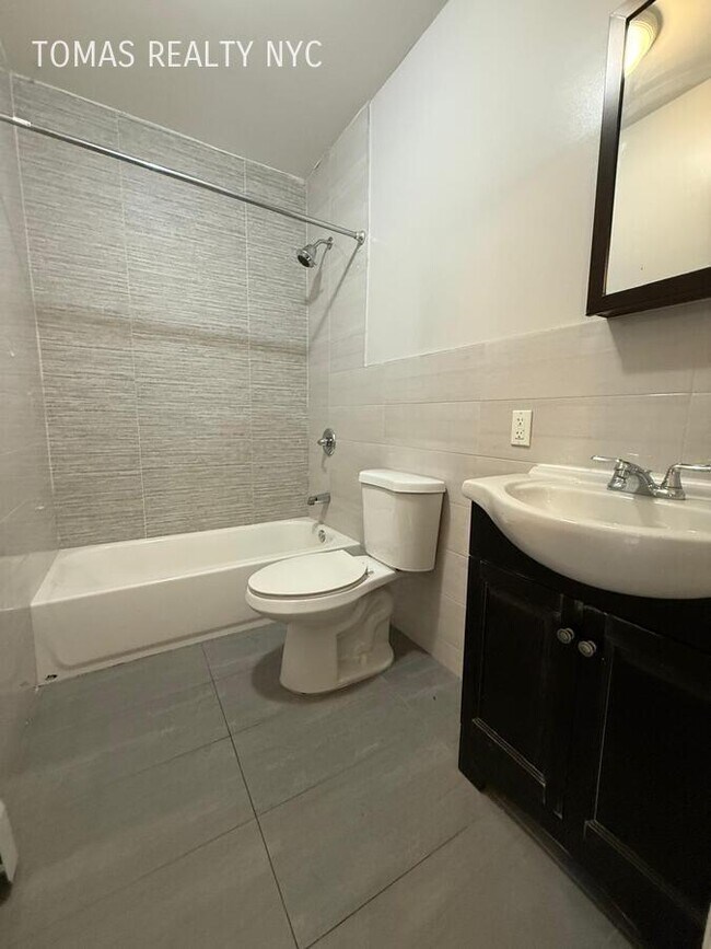 Photo - 727 E 181st St Unit 2