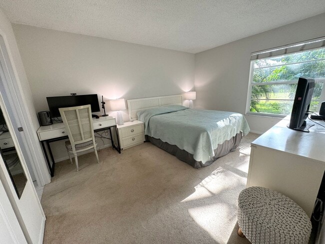 Photo - 5-Min Walk to FAU – Private Room in Furnished 2/2 Condo w/ Pool & Canal Views – $1,700