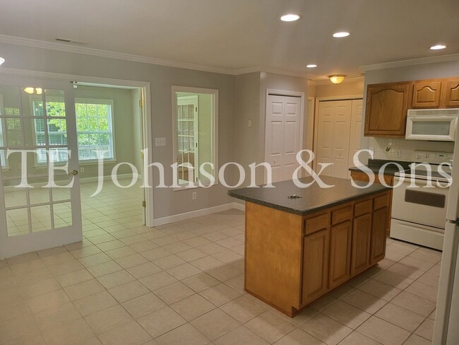 Photo - Charming 3BR Home with Bonus Room, Screened Deck & Two-Car Garage