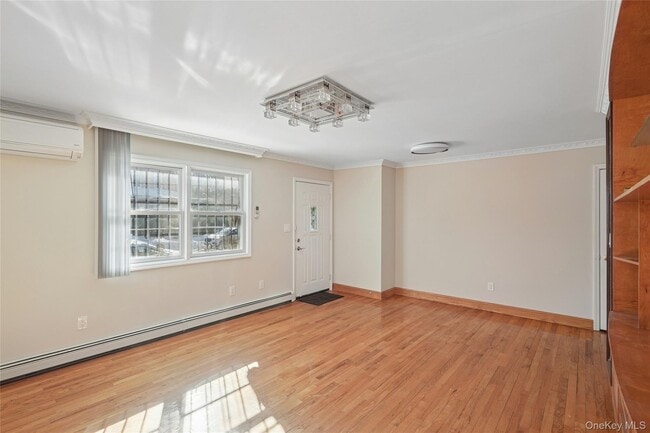 Photo - 214-27 38th Ave