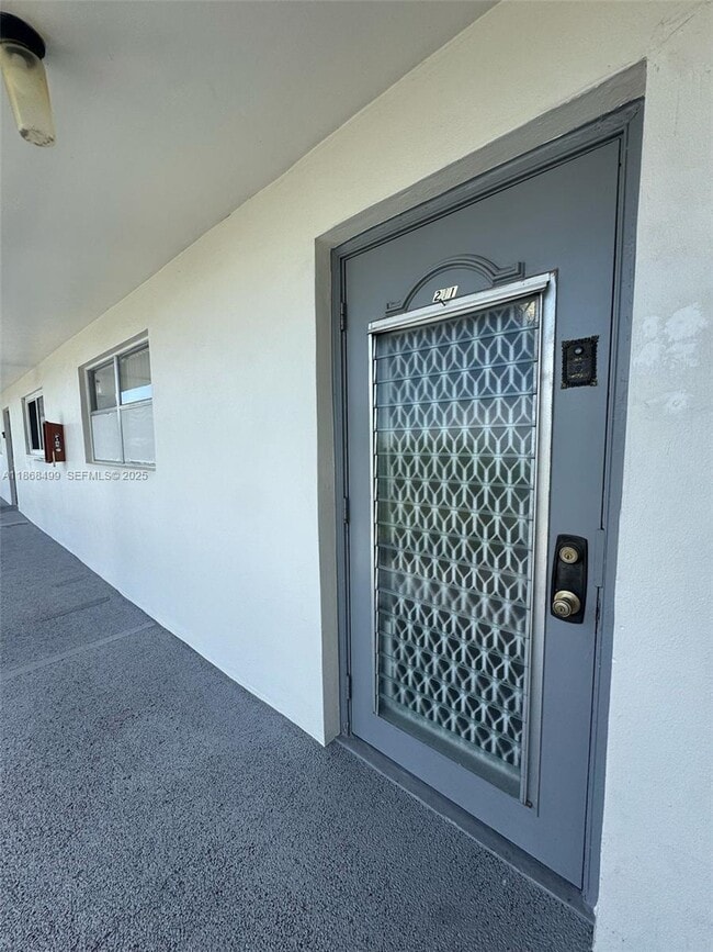 Building Photo - 8450 Sunrise Lakes Blvd Unit 211