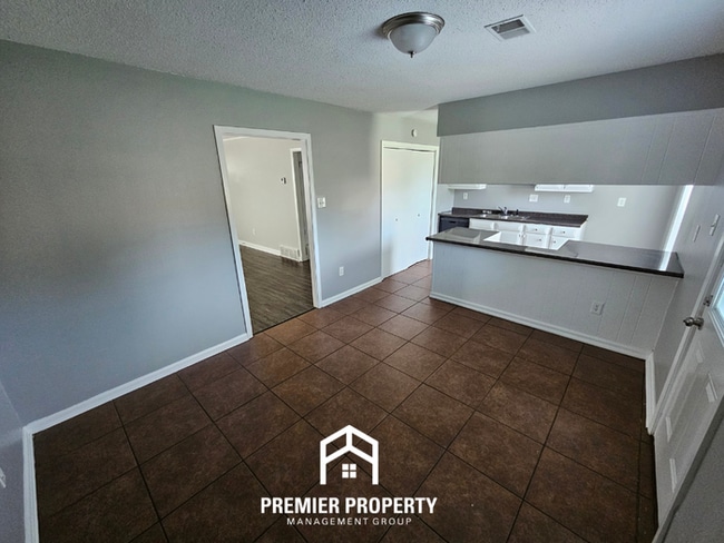 Photo - Charming 3BR/2BA Near Kirby | Hardwood Floors, Rustic Fireplace & Large Yard