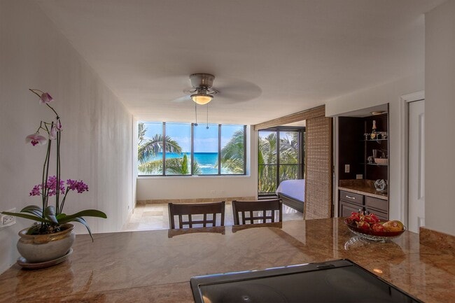 Building Photo - BEACH FRONT CONDO- Pool, spa and BBQ area Unit 404