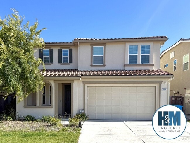 Building Photo - Spacious 5-Bedroom Home | Private Yard + Attached Garage