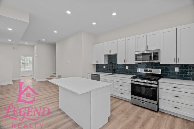 Building Photo - Completely Renovated 4BR Brick Home with 3 Full Baths & Off-Street Parking