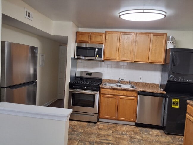 Upgraded kitchen - 8417 Greenbelt Rd Unit 201