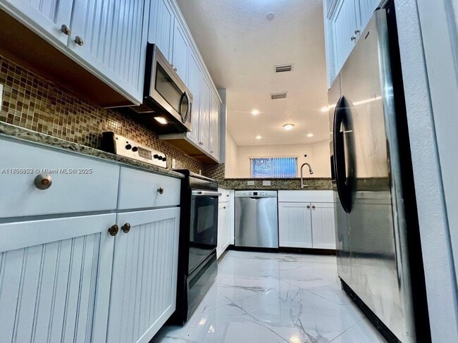 Photo - 8962 SW 18th St Townhome