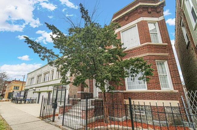 Photo - 6111 S Eberhart Ave Unidad 1