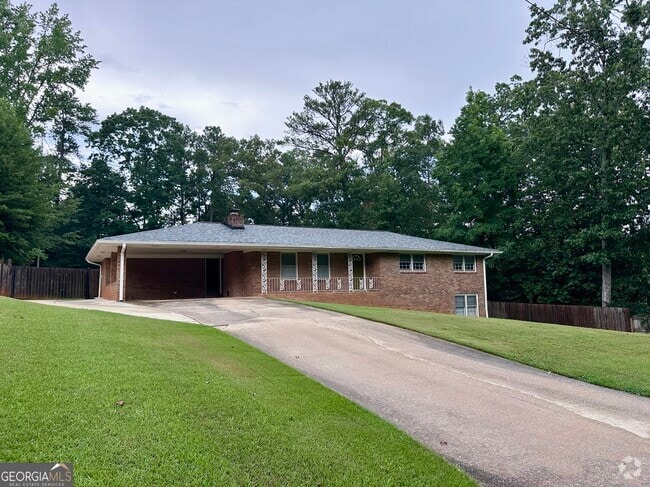 Building Photo - 5506 Woodland Dr Rental