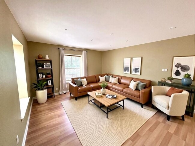 Building Photo - *MOVE IN SPECIAL* Upstairs Condo with Premium Amenities & Hardwood Floors!