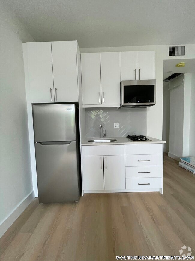 Building Photo - 1127 Harrison Ave Unit 219 Rental