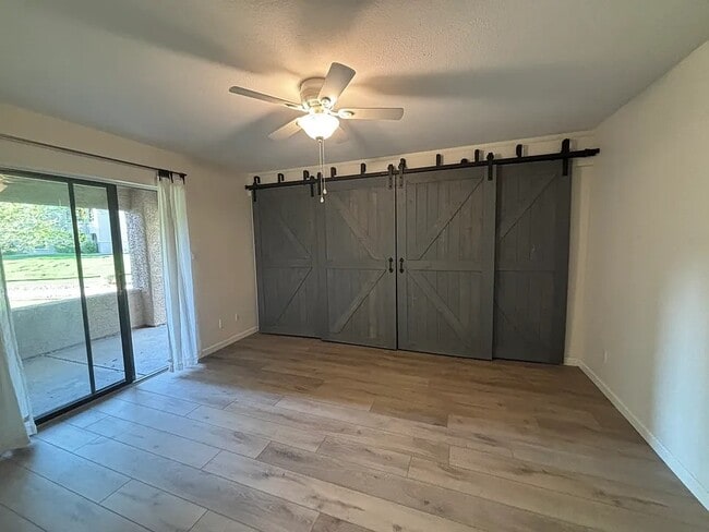 Building Photo - 9550 N 94th Plz Unit 104