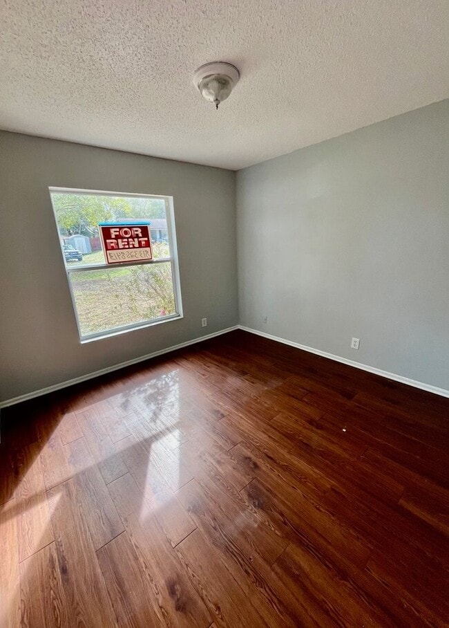 Photo - SPACIOUS 3BR/1.5BA w/Carport, Beautiful Wood Finish Flooring, Privacy Fenced Backyard! NO APP FEE!