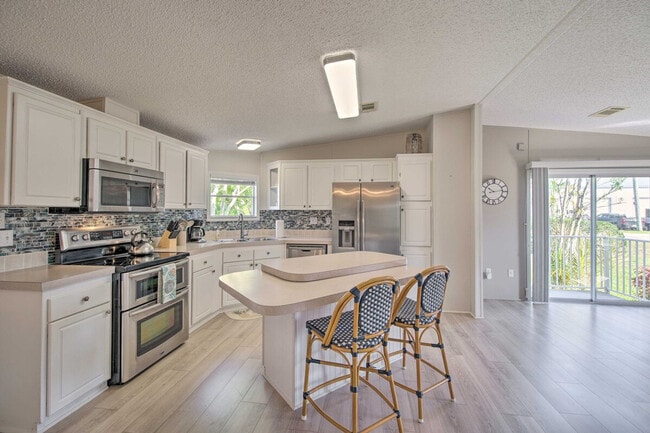 Photo - 9896 61st Terrace Unit ID1385860P