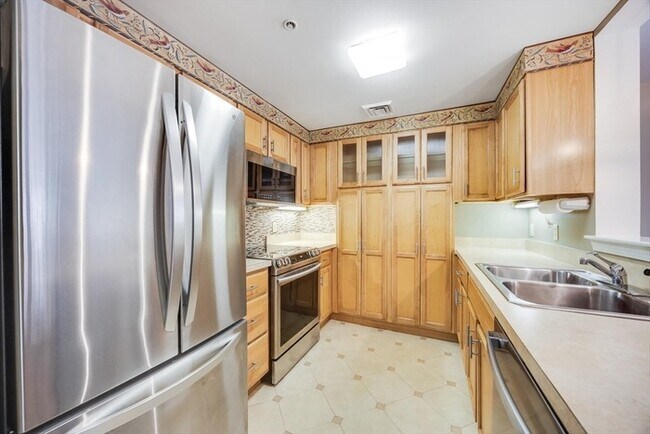 Photo - Updated 2BR Condo with Balcony, Garage Parking & Resort-Style Amenities Unit 106