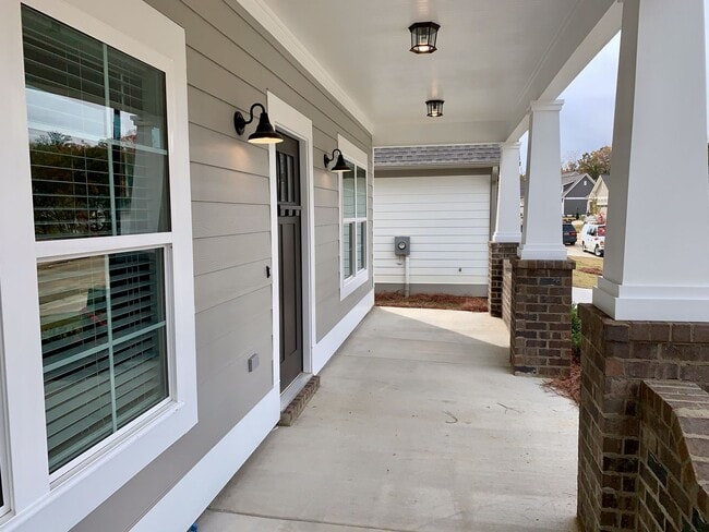 Photo - One level home with fenced backyard.