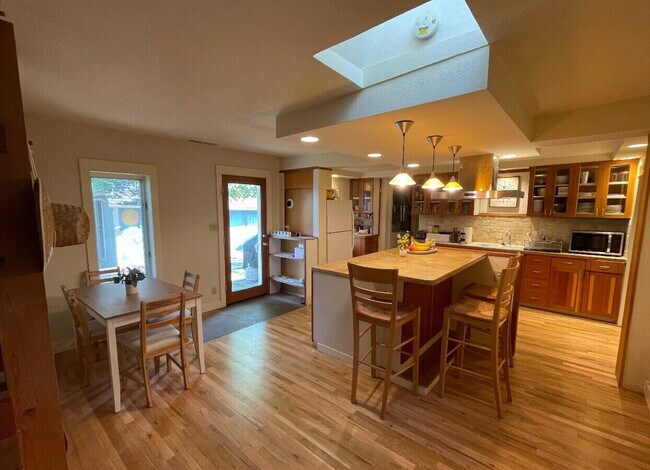 "House on The Hill, Updated and Renovated, Private Fenced Yard – 9th and University!"