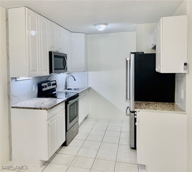 Photo - 826 Wiggins Pass Rd Unit 214