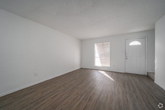 2BR, 2.5BA - 1,328SF - Living Room - Springwood Park Apartments