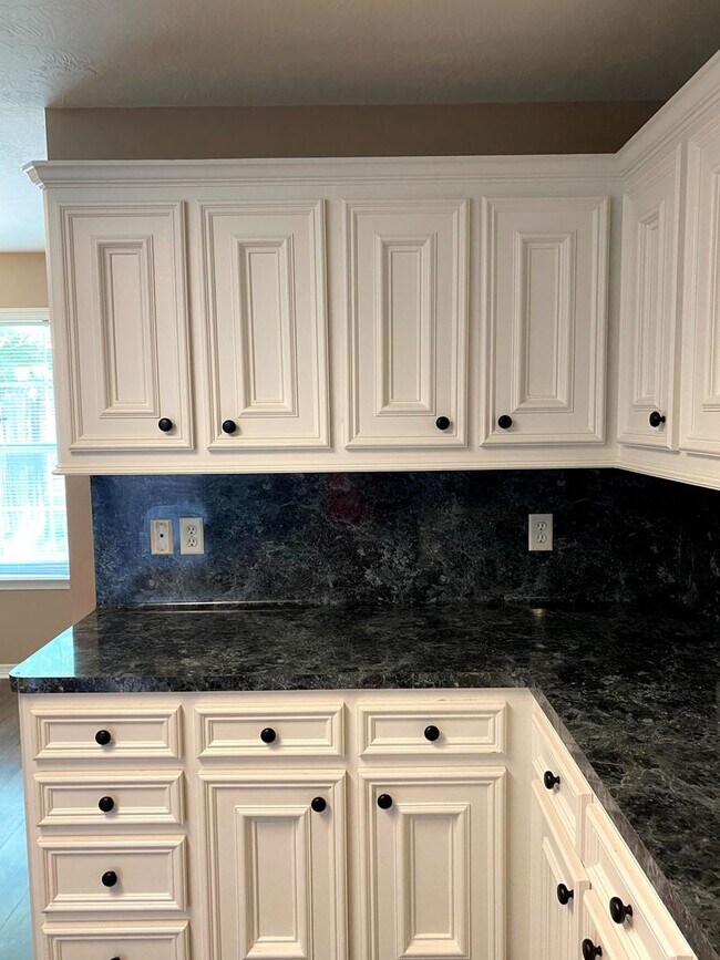 Photo - FABULOUS THREE BEDROOM HOME WITH LARGE DECK, FIREPLACE AND FLEX ROOM