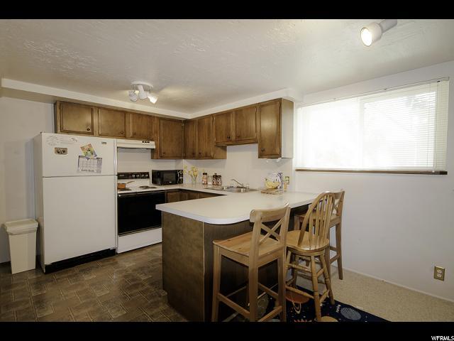 Large kitchen, great natural light - 1319 Westminster Ave S Unit Main Level