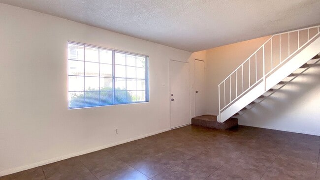 Photo - Great 3 bedroom and 1.5 bath townhouse with a small yard and 2 car garage.