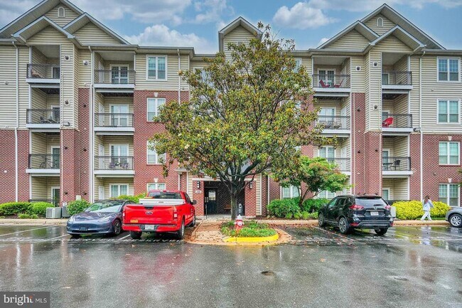 Building Photo - 1580 Spring Gate Dr. Unit 4310
