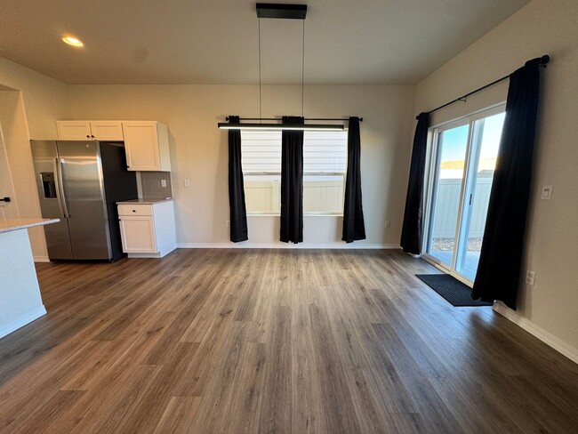 Photo - Spacious 3-Bedroom, 3-Bathroom Two-Story Home with Modern Finishes & Fenced Yard