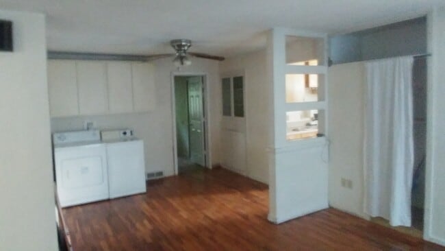 dining/laundry before updated laundry - 1031 Quivera Cir Unit 1